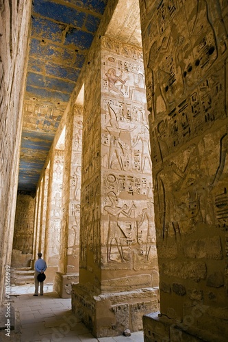 Painted Carvings Of Hieroglyphs And Figures At Medinet Habu © moodboard