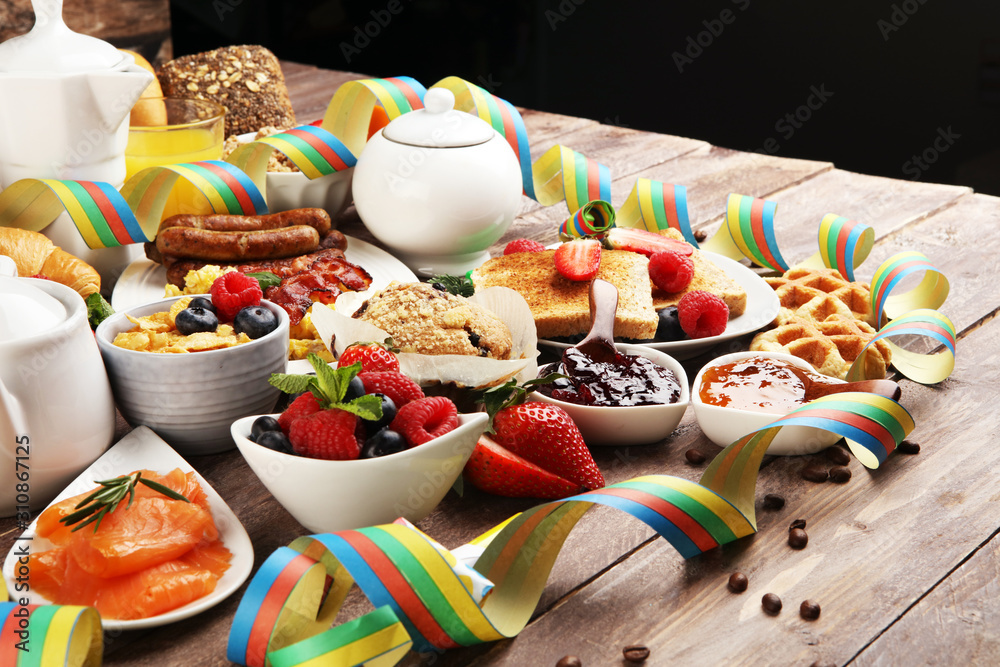 Breakfast served with coffee, orange juice, croissants, cereals and fruits. Balanced diet. Continental breakfast on carnival or new year
