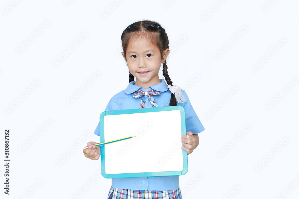 Portrait of asian little girl holding pencil pointing on blank white blackboard isolated on white background. Schoolgirl and Education concept. Portrait of asian little girl holding pencil pointing on blank white blackboard isolated on white background. Schoolgirl and Education concept.