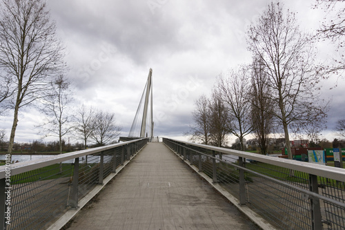 view of the Passerelle des Deux Rives Bridge over the Rhine River outside of Strasbourg