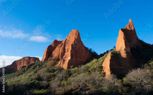 Red mountains and forest in Spain