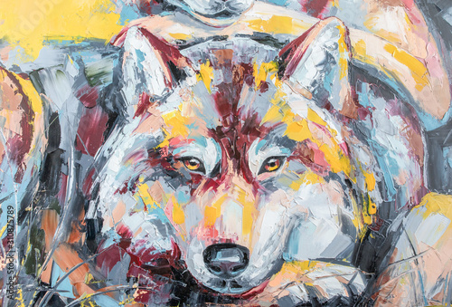 Oil wolf portrait painting in multicolored tones. Conceptual abstract painting of a couple wolves. Closeup of a painting by oil and palette knife on canvas.