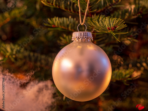 Decoration of a Christmas tree in close up view 
