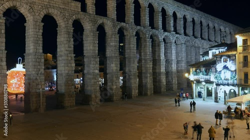 Timelapse of people near the ancient Roman aqueduct in Segovia, Spain