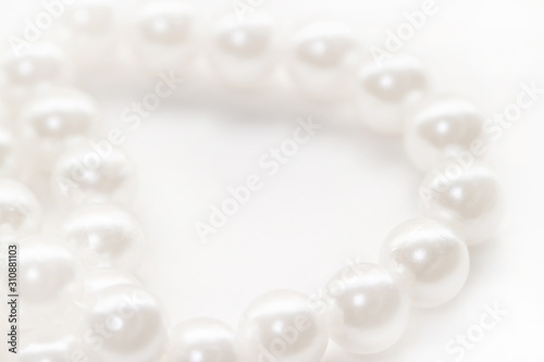 White pearl beads isolated background