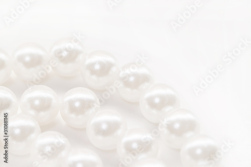Three pearl beads strings isolated white background