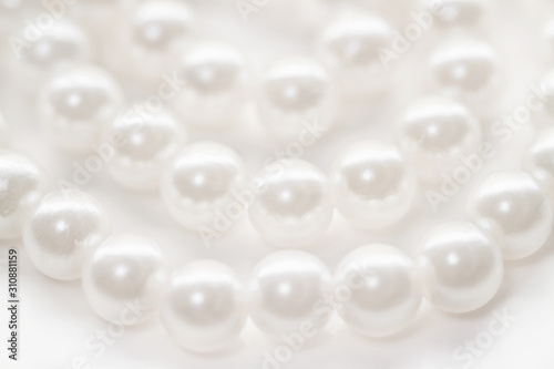 Pearl beads strings isolated white fashion background