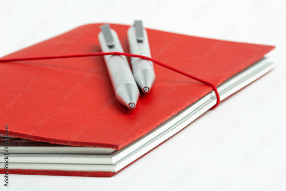 Red Leather Journal Cover With Elastic Band And Two Ballpoint Pens Red Leather Journal Cover With Elastic Band And Two Ballpoint Pens