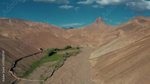 aerial view of grazing land at the base of magnificent valley photo