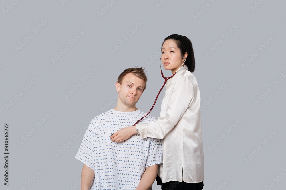 Patient being examined by the doctor Patient being examined by the doctor