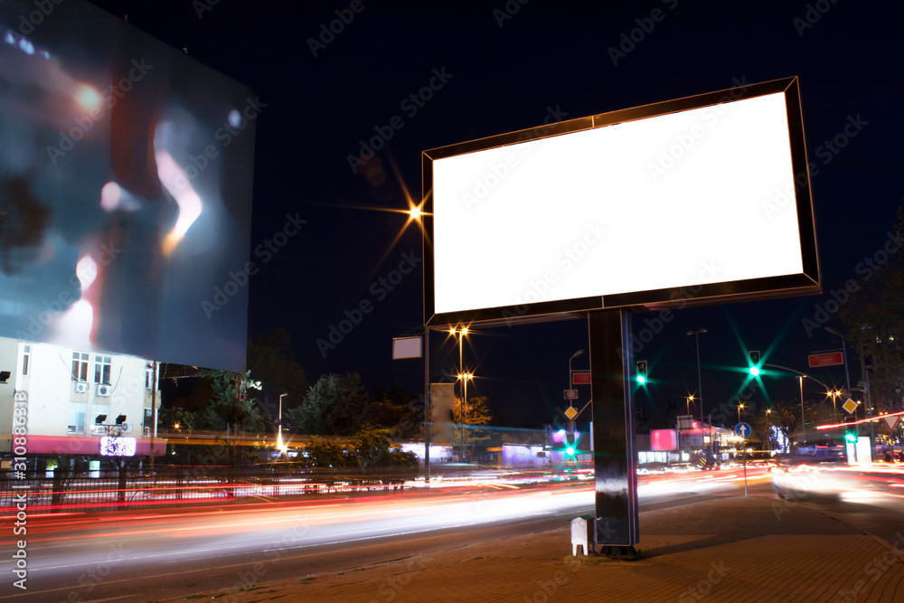 Billboard outdoor, advertising mockup, empty frame copy space for logo and text. Modern flat style signboard. Outdoor street banner night shot, long exposure. Billboard outdoor, advertising mockup, empty frame copy space for logo and text. Modern flat style signboard. Outdoor street banner night shot, long exposure.