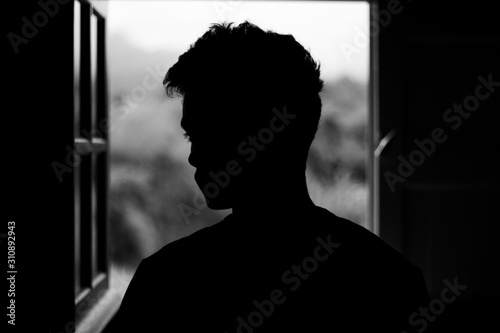 Sad men black silhouette window alone black and white
