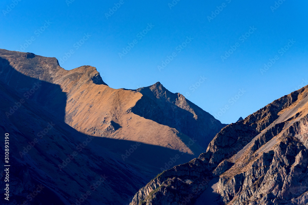 Fototapeta premium Scenic landscape with rocks in North Caucasus mountains in autumn on sunny day