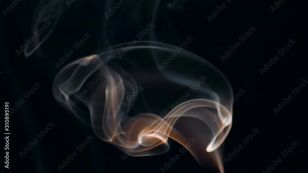Pulsating Color Gas Jet. A thin stream of smoke curls into bizarre shapes and fills the space Pulsating Color Gas Jet. A thin stream of smoke curls into bizarre shapes and fills the space