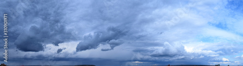 Cloudy sky. Autumn atmospheric phenomenon, panoramic photography, mid-September.