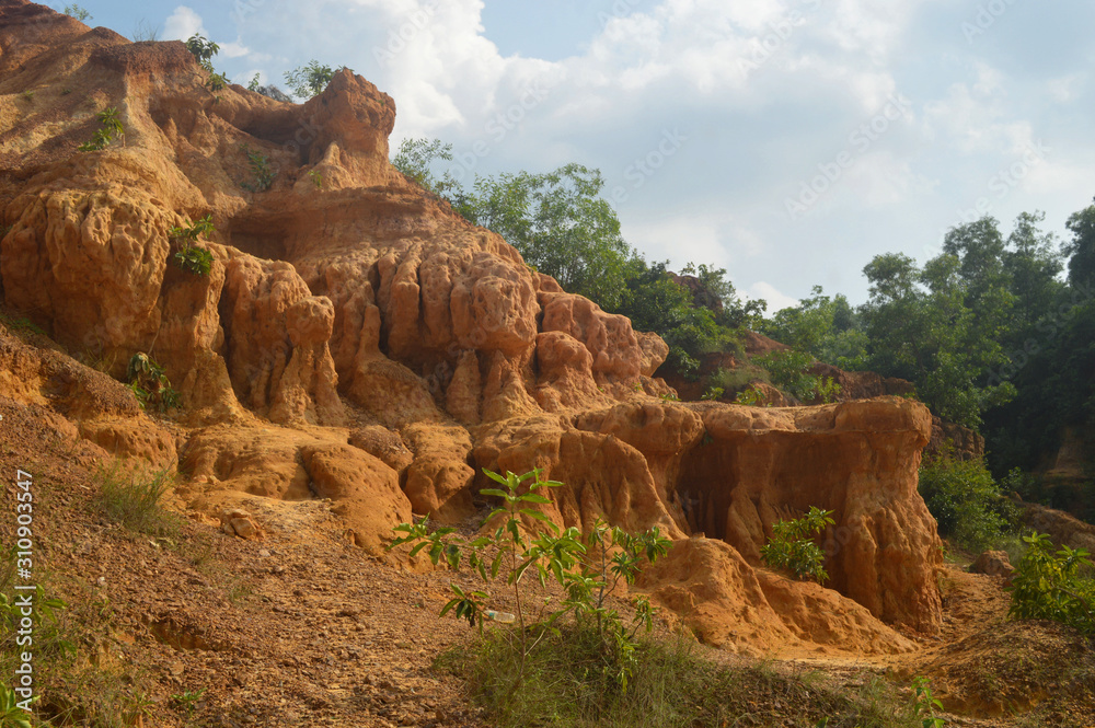 Gangani, the beautiful red Grand Canyon of West Bengal,with blue Gangani, the beautiful red Grand Canyon of West Bengal,with blue
