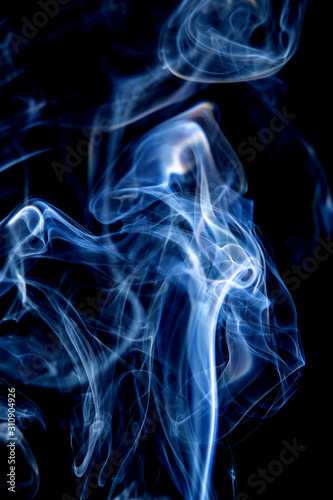 Abstract motion of white smoke isolated on a black background Can be modeled as hot food, smog, small clouds, and aromatic smoke.