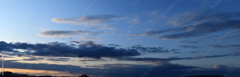  Evening cloudy sky. Autumn atmospheric phenomenon, panoramic photography, mid-September.