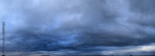  Evening cloudy sky. Autumn atmospheric phenomenon, panoramic photography, mid-September.