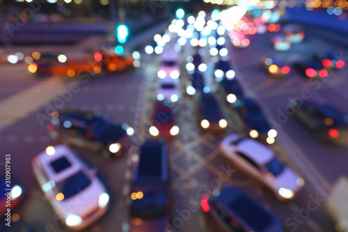 Defocused photography of crossroad filled  moving cars in night Moscow. Top view / view from above.