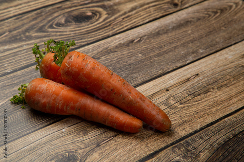 Red carrots on a wooden background.Vegetables.