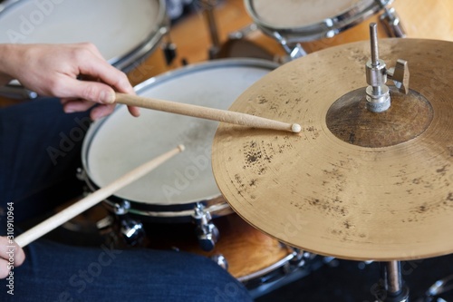 Hands Playing Drum Set