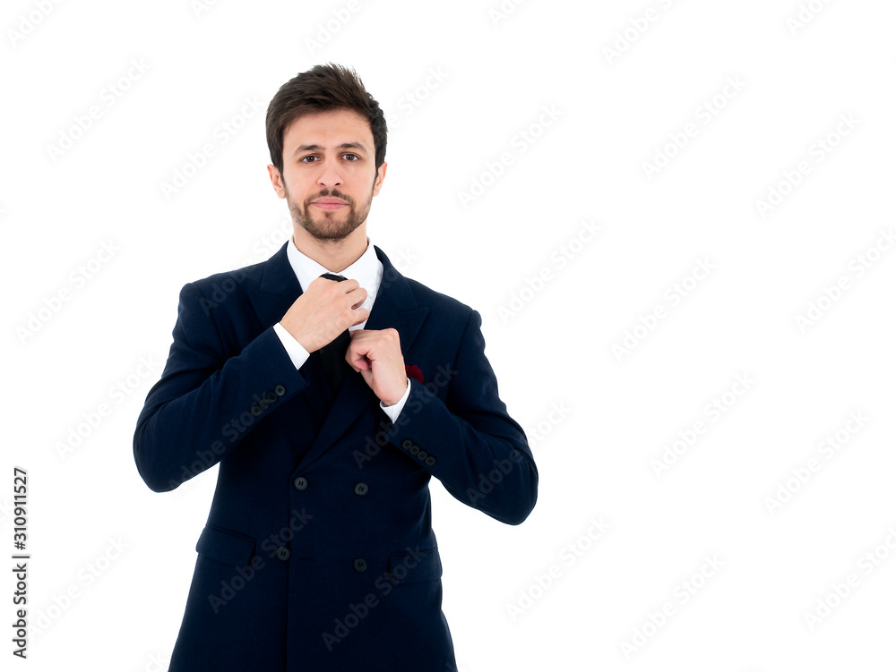 Adult Caucasian professional businessman handsome adjust necktie in midnight blue modern blazer suit formal fashion cloth with serious face show smart worker lifestyle on white isolated background Adult Caucasian professional businessman handsome adjust necktie in midnight blue modern blazer suit formal fashion cloth with serious face show smart worker lifestyle on white isolated background