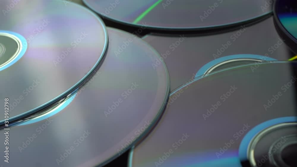 old compact discs on the table