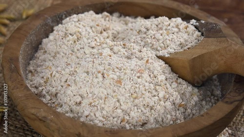 Rotating Oat Flour as seamless loopable 4K footage