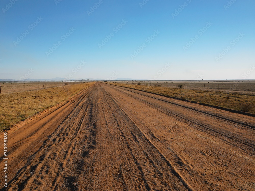 Country View Of Long And Straight Dirt Road