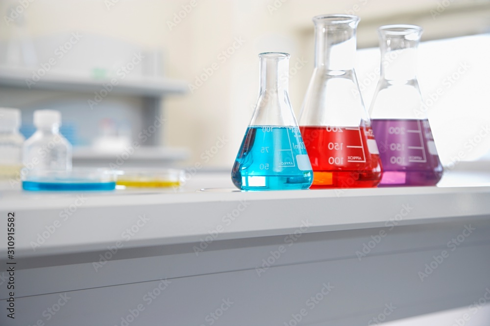 Multicolored Liquid In Beakers Multicolored Liquid In Beakers