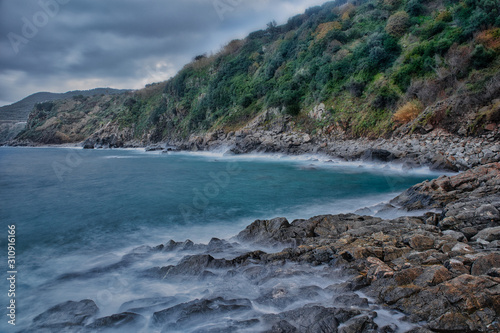 The rocks of the bay of Rovaglioso, in the purple coast.