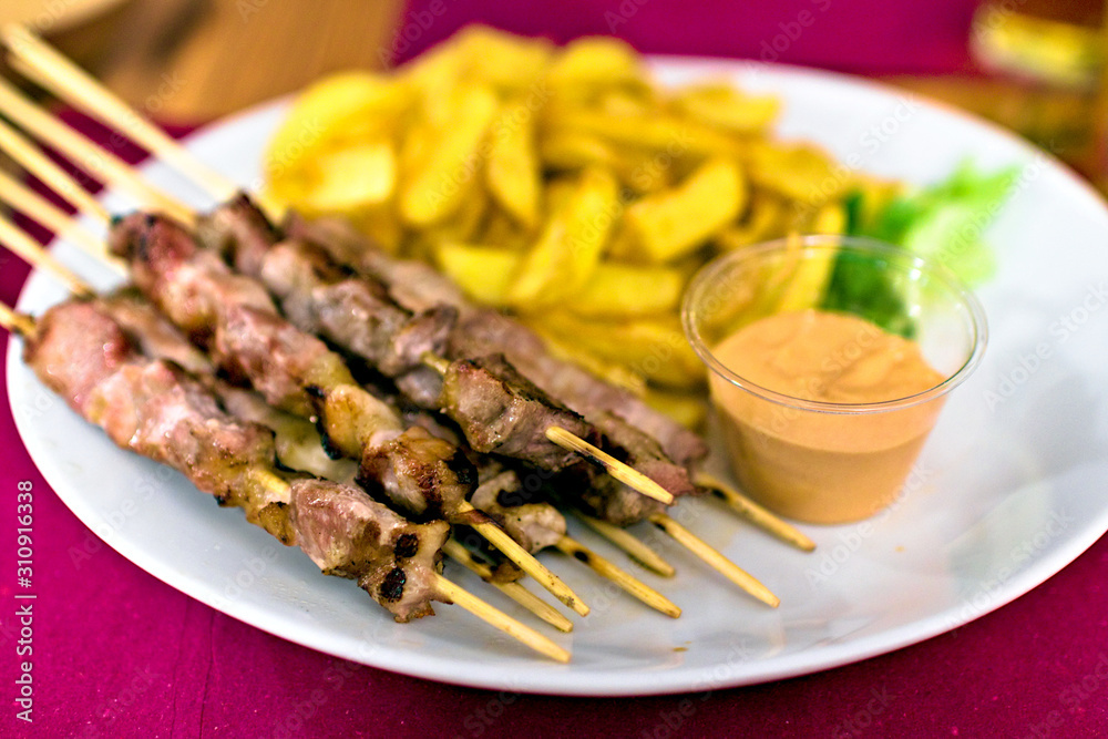 Typical italian meal made of Abruzzo kebabs or Typical italian meal made of Abruzzo kebabs or