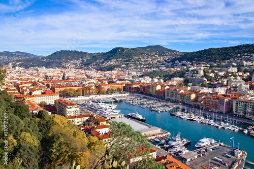 Nice, France - December 1, 2019: Panoramic aerial view over the Lympia port of Nice, France, on a clear winter morning, with Mount Boron hill on background © Marco