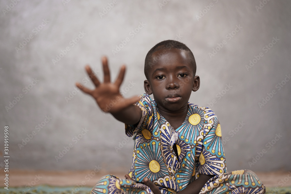 Sad African Boy Shows Stop Symbol with Hand Sad African Boy Shows Stop Symbol with Hand