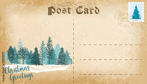 Vintage Christmas post card with pine forest and empty space for text.