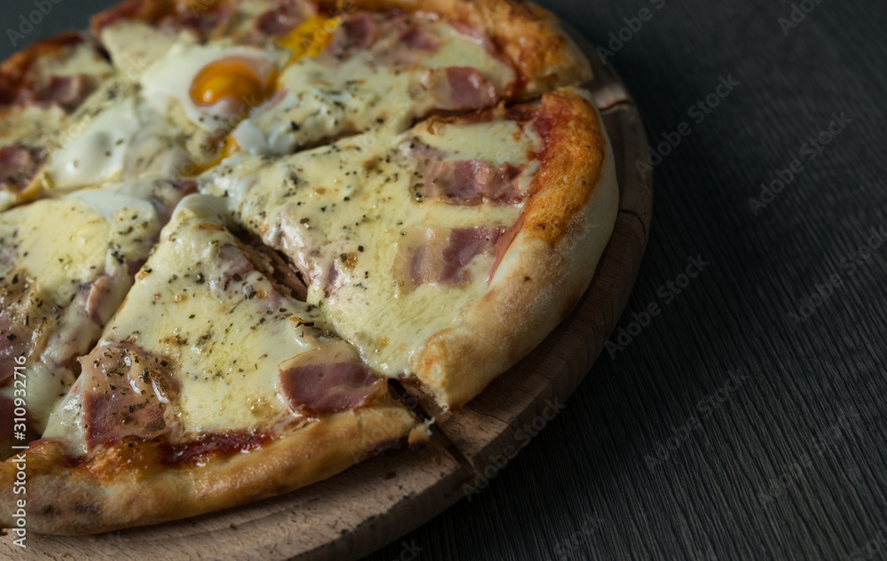 Pizza with prosciutto and cheese. Pizza with prosciutto and cheese.
