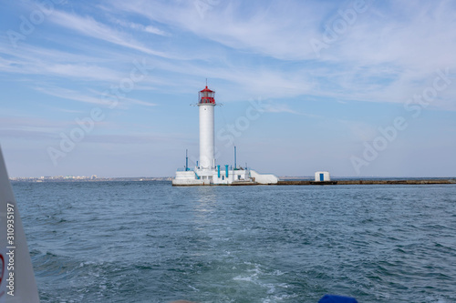 Lighthouse at sea. Light for sailors