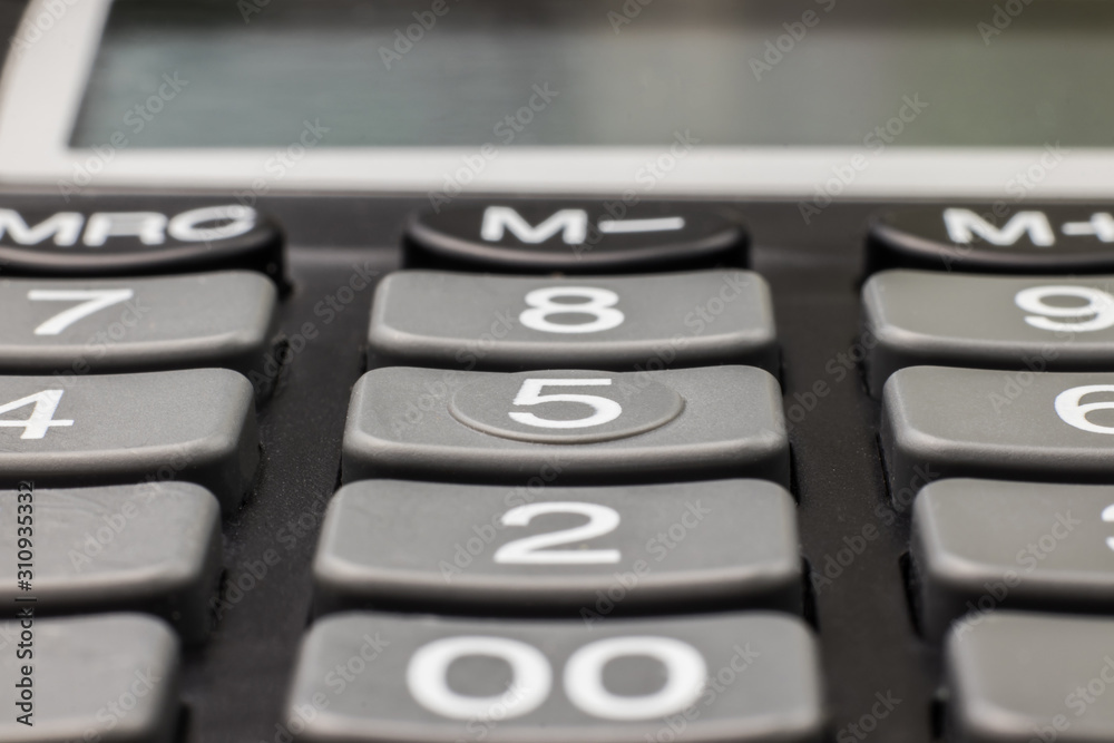 Numbers on calculator buttons close up Numbers on calculator buttons close up