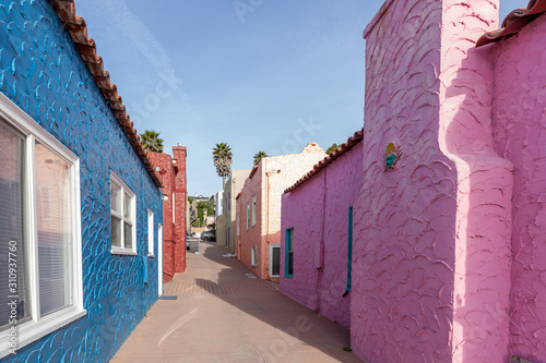 Santa Cruz, California, USA - March 31, 2018: Colorful houses at Capitola Village by the Sea, one of the oldest vacation retreats on the Pacific Coast. photo