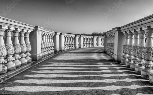 Roof of the orangery with freestone banisters, Schadows on the floor, of old Castle Schwerin, in Black and White Germany