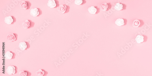 Flowers composition creative. Pink flowers on pastel pink background. Valentines Day, Easter, Birthday, Happy Women's Day, Mother's day. Flat lay, top view, copy space