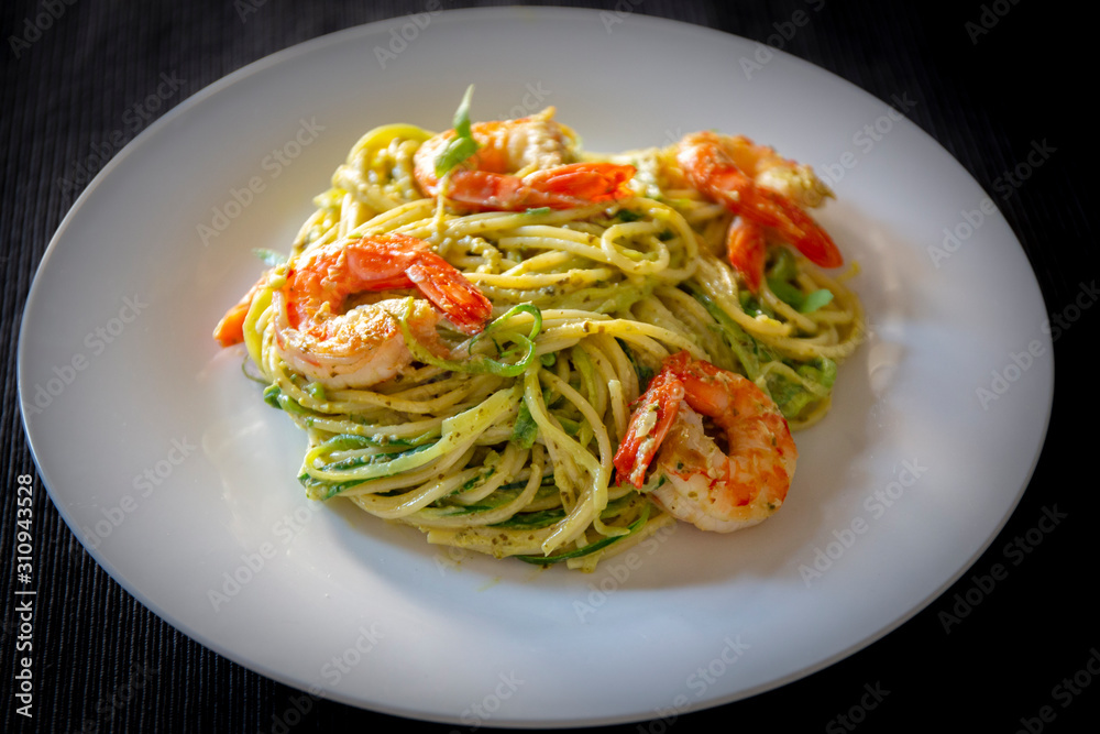 King prawns and pesto sauce with spaghetti King prawns and pesto sauce with spaghetti