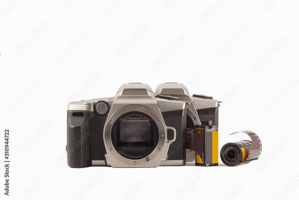 35 mm analog camera on a white background. Film camera.