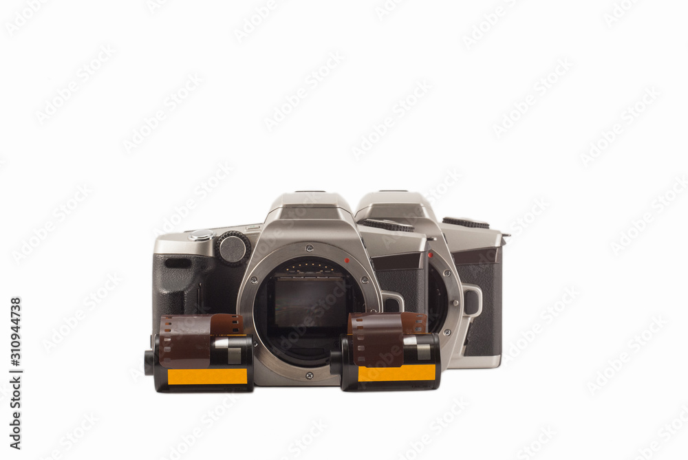 35 mm analog camera on a white background. Film camera. 35 mm analog camera on a white background. Film camera.