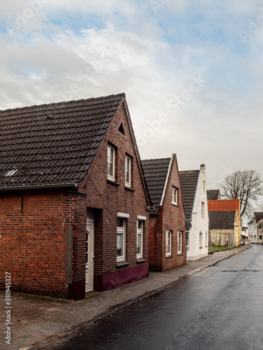 Norden, Germany. 8 December 2019. Small red brick working class homes.
