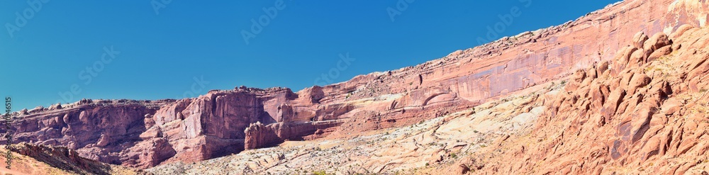 Looking back towards Moab Panorama views of desert mountain ranges along Highway 191 in Utah in fall. Scenic nature near Canyonlands and Arches  National Park. United States of America. USA.