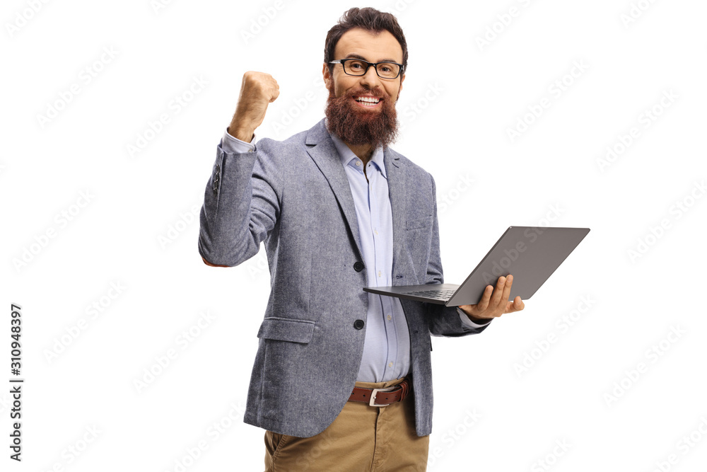 Happy bearded man gesturing win and holding a laptop computer Happy bearded man gesturing win and holding a laptop computer