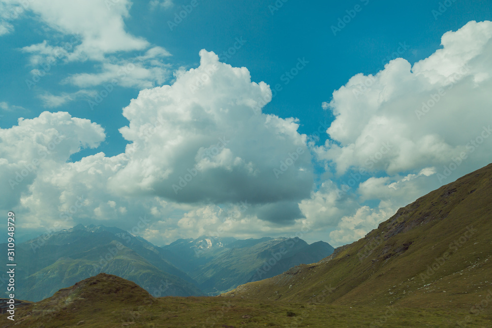 Beautiful view of spring landscape on the mountains and peaks in the snow in the Alps. Austria Beautiful view of spring landscape on the mountains and peaks in the snow in the Alps. Austria