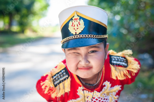 Roi Et, Thailand - December 19,2019 : Unidentified Thai students 6 - 18 years old in ceremony uniform during sport parade on December 19,2019 in Thawat Buri, Roi Et Thani, Thailand. photo